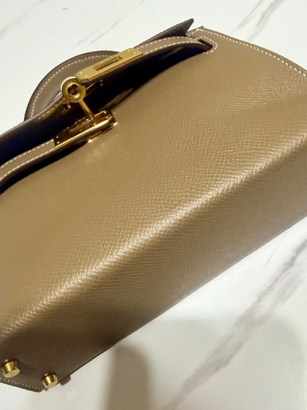 Mini top handle bag.. Kelly